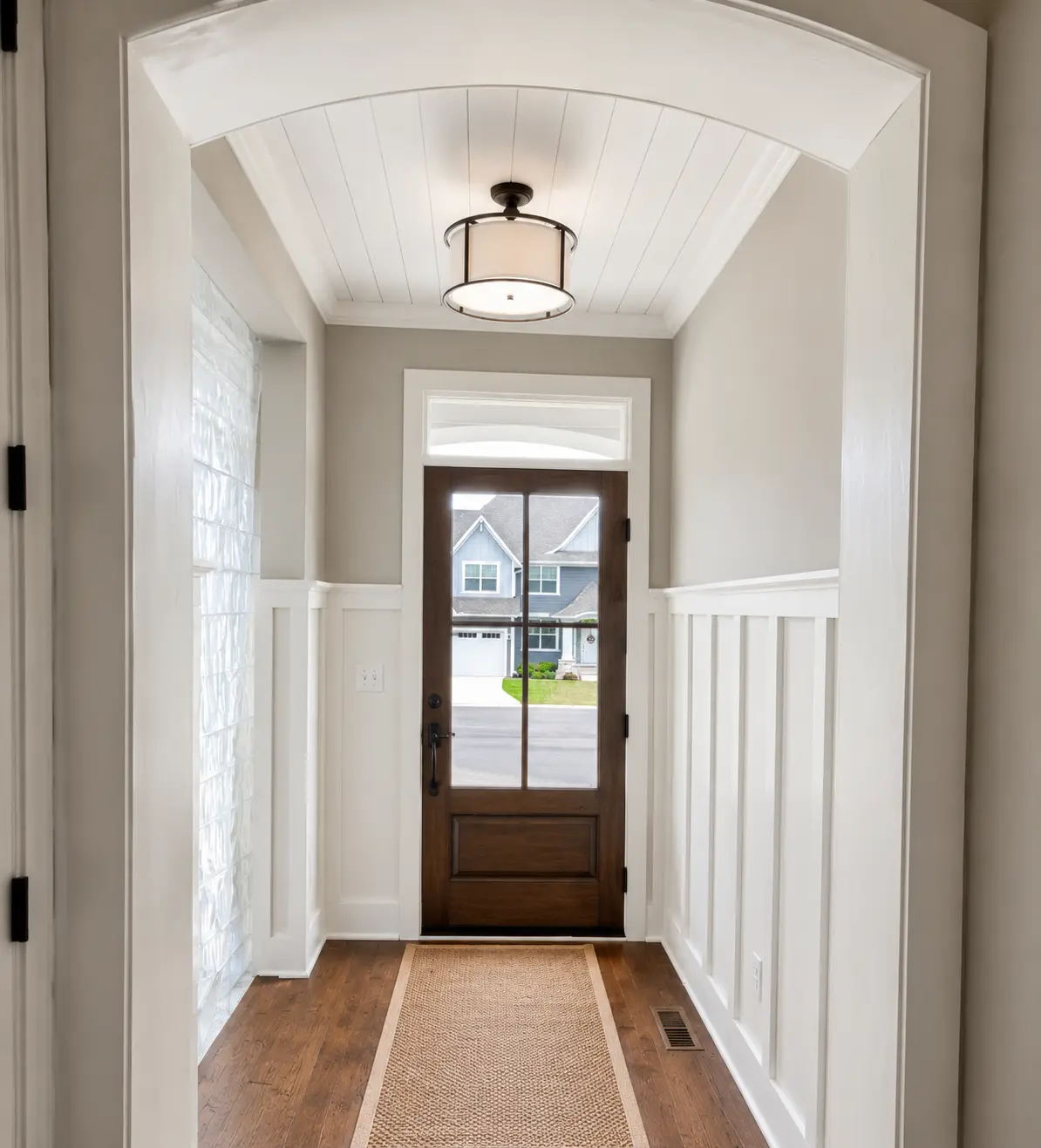 Detailed interior trim and entry millwork presentation based on Signature Finish Carpentry project work